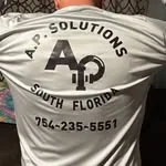 The same AP mark today, on the A.P. Solutions shirt